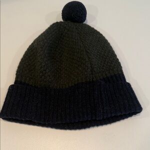 Agnes B. Olive Green and Navy Knit Beanie hat; 100% wool.